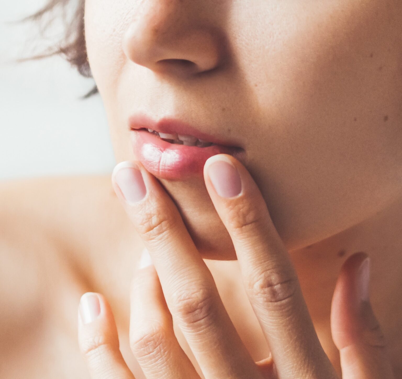 Image Close up portrait of woman on white background. Natural beauty without make up.