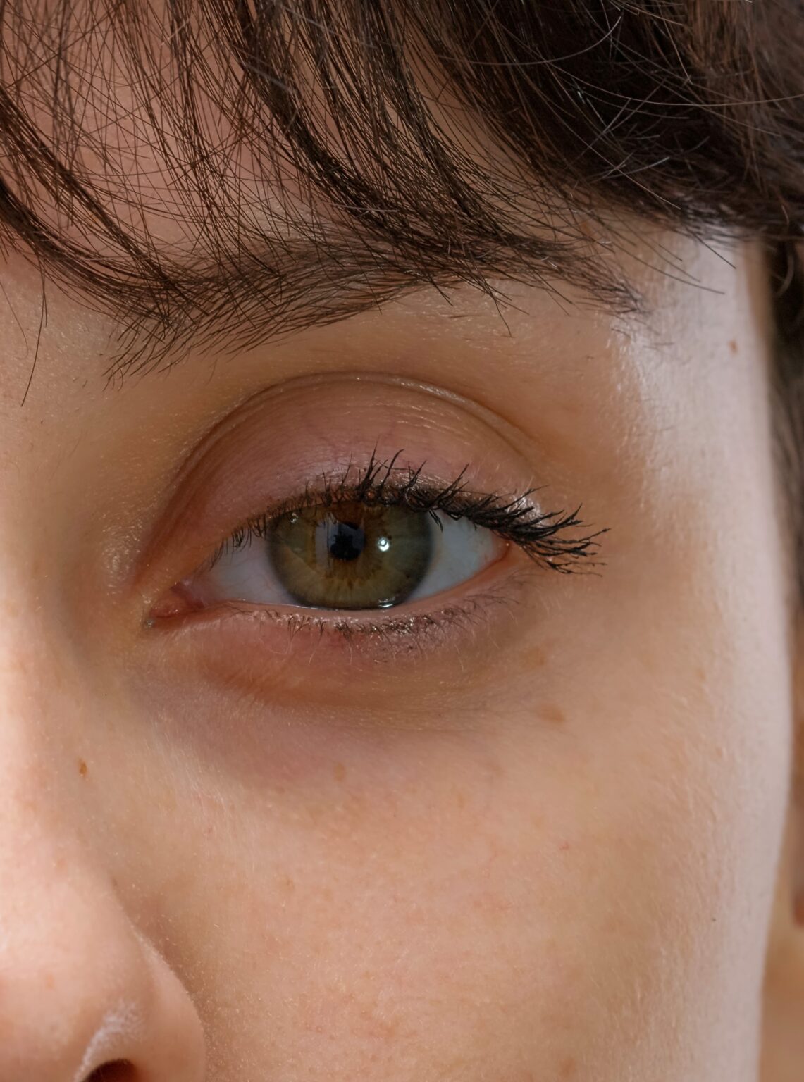 Image Macro shot authentic portrait of woman with natural skin